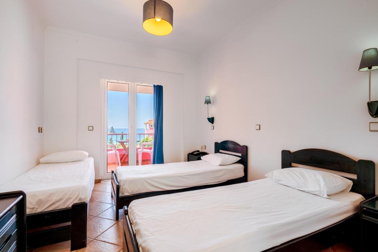 The Pink Palace Hostel อากิออส กอร์ดิออส ห้อง รูปภาพ